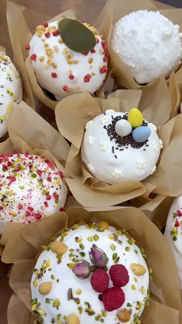 Decorated paska Easter cakes — pistachio, rose, gold leaf