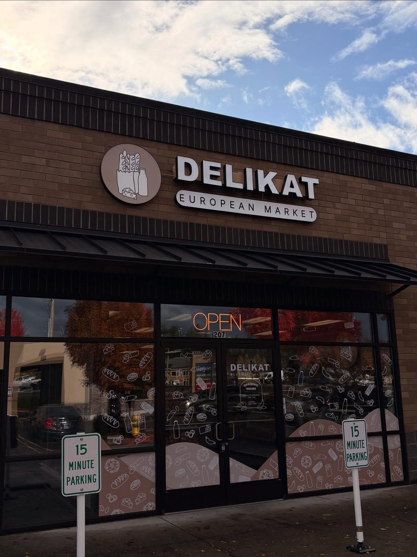 Delikat European Market storefront on a sunny day